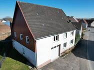 Geräumiges Einfamilienhaus mit Garten und Garage in Borgentreich-Natzungen - Borgentreich (Orgelstadt)