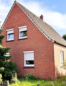 Geräumiges Einfamilienhaus mit großem Grundstück in zentraler Lage von Bunde - Bunde