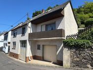 Sanierungsbedürftiges Einfamilienhaus mit Garten und Garage in Niederfell zu verkaufen - Niederfell