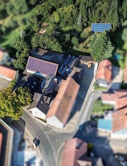 Vielseitige Nutzungsmöglichkeit! Gepflegtes Mehrparteienhaus mit Gewerbe, Lagerhallen und weitläufigen Garten! - Untersiemau