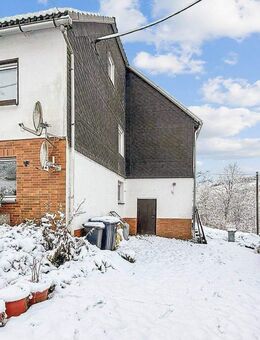 Modernisierte Doppelhaushälfte mit Ausbaureserve und Pelletheizung in Bad Berleburg - Bad Berleburg