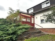 Erdgeschosswohnung mit Wintergarten und Gartenanteil - Trogen