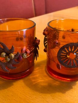 2 orange Teelichter mit Ornamenten - Holdorf (Niedersachsen)