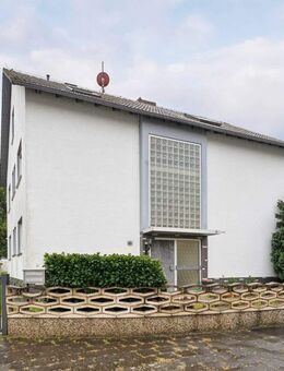 Sofort bezugsfrei: Attraktives Mehrfamilienhaus mit Garten in Königstädten - Rüsselsheim