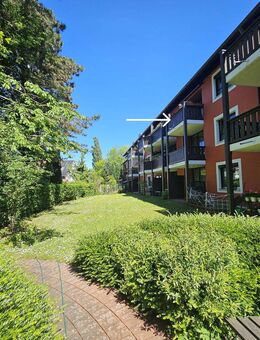 Geschmackvolle 4-Raum-Maisonette-Wohnung mit gehobener Innenausstattung mit EBK und großem Balkon - München