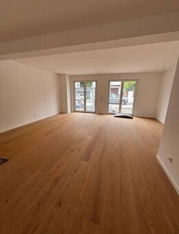 2-Zi-Neubau-Gartenwohnung über zwei Etagen & Hobbyraum beheizt mit Bad (Souterrain) - München