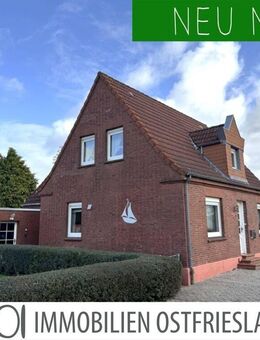 Direkte Aussicht auf Deich und Ems! Renovierungsbedürftiges Einfamilienhaus mit Garage & Nebengebäude in ruhiger Sackgassenlage - Moormerland