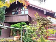 Idyllisches Einfamilienhaus mit großem Wintergarten, Doppelgarage und herrlichem Grundstück! - Wüstenrot