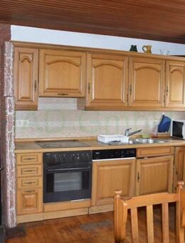 Großzügiges Mehrfamilienhaus mit Halle, Lagerflächen und mit einem großen Garten - Ortenburg