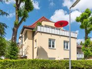 AIGNER - Lichtdurchflutete Dachgeschosswohnung mit sonnigem Balkon - München