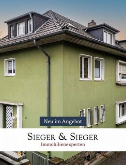 Kapitalanlage in Troisdorf: Dreiparteienhaus mit Garagen - Troisdorf