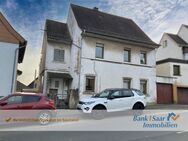 Bexbach: Einfamilienhaus mit großem Garten und Garage - ideal für Familien oder Investoren - Bexbach