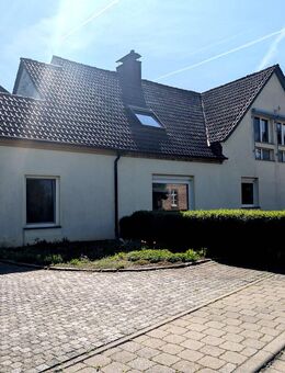Einfamilienhaus mit Einliegerwohnung, Gartenidylle & Garagen - Kemberg