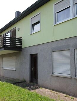 Familienfreundliches Einfamilienhaus mit Garten – inklusive Garage und Carport in Bad Brückenau zu verkaufen - Bad Brückenau