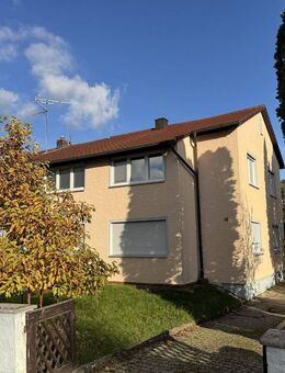 Gut gelegene Doppelhaushälfte mit großem Garten und Bauland - Heßdorf