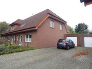 ***BUESCHER IMMOBILIEN*** Schickes Reihenendhaus mit Teilkeller, Garage und Eigentumsgrundstück in zentraler Wohnlage von Epe - Gronau (Westfalen)