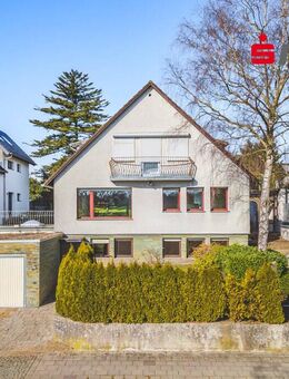 Frei stehendes Einfamilienhaus mit Einliegerwohnung und Garage - Aachen