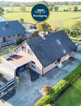 WOHNTRAUM MIT WEITBLICK IN BESTLAGE - EINFAMILIENHAUS MIT GARAGE, KAMIN UND NATURNAHER UMGEBUNG - Varel