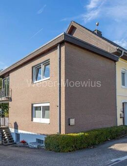Freistehendes, modernisiertes Einfamilienhaus mit ELW in zentraler + verkehrsgünstiger Ruhiglage - Lohmar