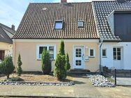 Charme der 30er trifft Familienkomfort - Doppelhaushälfte mit Charakter und Garten in Holtorf - Nienburg (Weser)