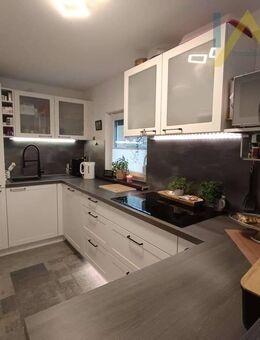 Hochwertig sanierte Maisonette-Wohnung mit Gartenanteil und Stellplatz - Alsheim