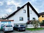 Vierfamilienhaus mit 6% Rendite mit Ausbaupotential in ruhiger Feldrandlage - Nidda