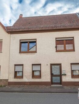 EINGEREIHT - vermietetes Einfamilienhaus mit kleinem Garten in Einöd! - Homburg