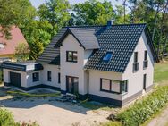 Mit Erdwärme, Fußbodenheizung, Einbauküche, Garage, Kamin u.v.m.: Neubau-Einfamilienhaus Bad Saarow - Bad Saarow