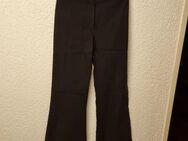 eine moderne Damenhose Stretchhose schwarz mit Zebramuster m Bund und an den Hosensaum Orsay Gr 38 2 x getragen - Bochum