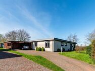 Ebenerdiges Wohnen im Grünen: Dieser Bungalow bietet Platz und viele Gestaltungsmöglichkeiten. - Oster-Ohrstedt