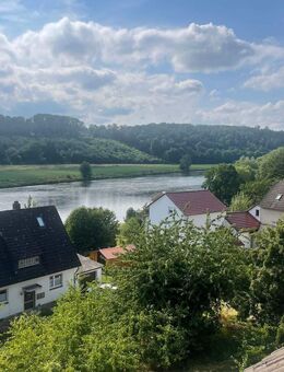 Wohlfühloase in naturnaher Lage !! Zweifamilienhaus mit fantastischem Fuldablick in Bergshausen - Fuldabrück
