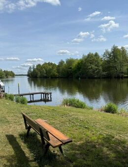DEUTSCHMANN IMMOBILIEN ***** ivd - Kleinhaus auf idyllischem Grundstück in unmittelbarer Seenähe! - Liepe