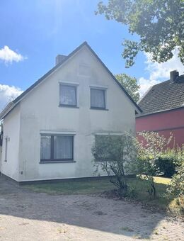 PURNHAGEN-IMMOBILIEN - Freistehendes Einfamilienhaus mit Garage in zentraler Lage von Bremen-Aumund! - Bremen