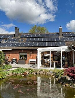 Sonnige Gartenidylle mit Teich – Ihr neues Zuhause in Tarp mit Ausbaupotenzial - Tarp
