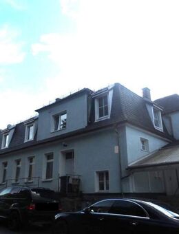 Objekt-Nr.: 11823 - vermietetes Wohn- und Geschäftshaus mit Garage und Garten in ruhiger Lage in Elsterberg - Elsterberg