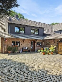 Familienfreundliche Doppelhaushälfte auf großem Grundstück im grünen Moers-Genend - Moers