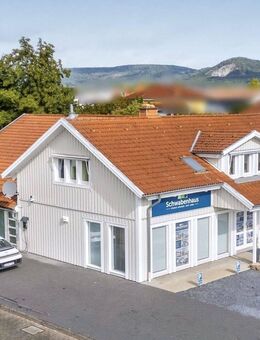 Charmantes Schwedenhaus: Vielseitiges Wohn- und Geschäftshaus mit großzügigem Garten und Raumvielfalt - Baunatal