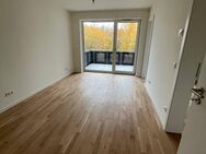 KfW-40! 2-Zimmer-Dachgeschoss-Wohnung mit EBK, West-Balkon, Echtholzparkett, HWR, Fahrstuhl, Tiefgarage - Rostock