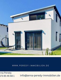 Eleganz trifft Natur - Ihr exklusives Zweifamilienhaus am Bernsteinsee - Sassenburg