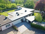 Provisionsfrei! Modernisierter Flachdachbungalow mit großem Garten in Erftstadt-Friesheim - Erftstadt