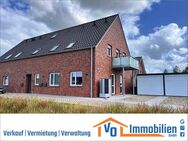 KfW-40 QNG: Neuwertige Oberwohnung mit Einbauküche, Balkon & Garage in der Blumenstadt Wiesmoor - Wiesmoor