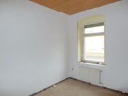 Preiswerte und frisch renovierte 1-Zimmer-Wohnung mit neuem Laminat in der Riesaer Innenstadt - Riesa
