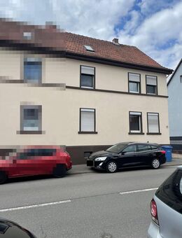 Doppelhaushälfte mit 3 Whg, Anbau und 4 Garagen - Hattersheim (Main)