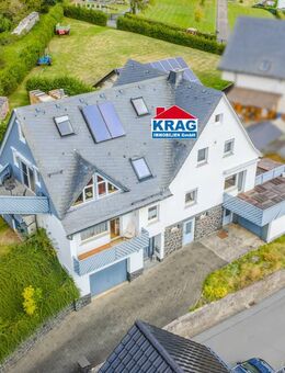 KRAG Immobilien ++ Vielseitiges Wohnhaus mit mehreren Etagen, Balkonen und Garagenanbau ++ - Bad Endbach