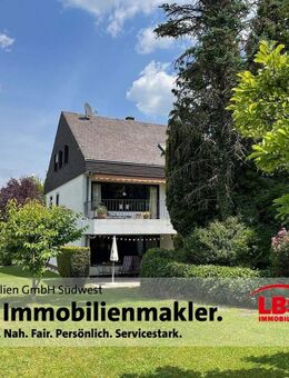 freistehendes Einfamilienhaus mit Einliegerwohnung in bevorzugter Wohnlage mit Garten und 2 Garagen - Trier