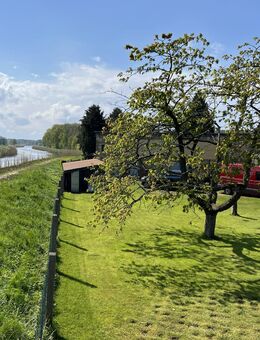 Wassergrundstück mit Einfamilienhaus - Grambin