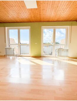 Attraktive Dachgeschosswohnung mit Balkon in Lollar! - Lollar