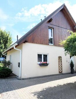 Freistehendes Einfamilienhaus mit Garten und Garage in kinderfreundlicher Lage - Kranenburg (Nordrhein-Westfalen)