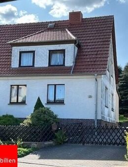 Sollstedt OT Wülfingerode - solide gebaute Doppelhaushälfte mit großem Grundstück - Sollstedt