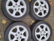 4 Stk. originale Mazda Alufelgen, 15x6JJ, gut gebraucht, bereift, Hersteller Enkei - Essen